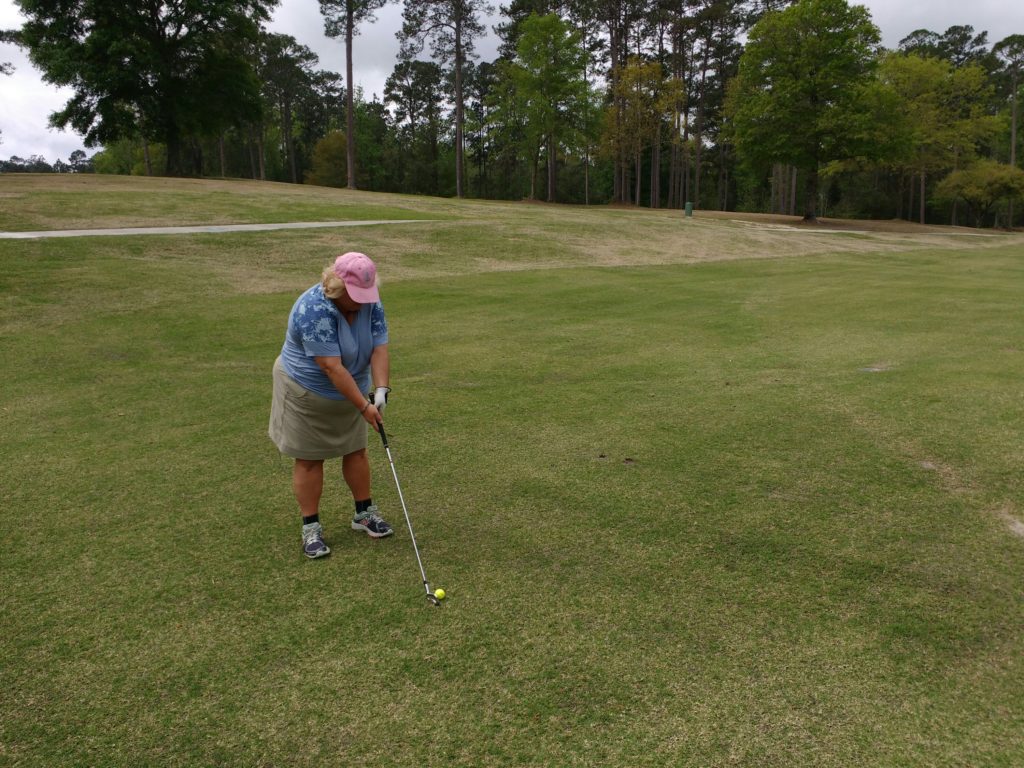 Mrs Ram takes a swing at golf